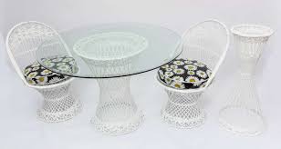 Set of four chairs with round sunbrella cushions and a glass top round table. Mid Century Modern Russell Woodard Spun Fiberglass Patio Furniture At 1stdibs