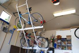 Weight lifting power squat racks. Double Motorized Bike Lift Strong Racks