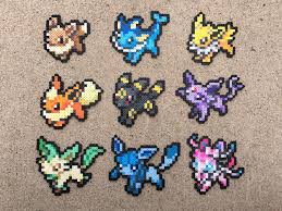 Eeveelutions Eevee Vaporeon Jolteon Flareon Umbreon Espeon Leafeon Glaceon Sylveon Pokemon Mini 8bit Nintendo In 2020 Pokemon Bead Perler Bead Art Perler Beads Designs