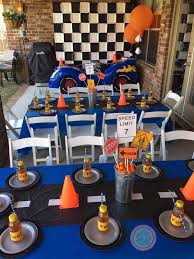 Hot Wheels Themed Tablescape With Flag Backdrop Two Fondant Covered Cakes With Cream Cheese Filling Hot Wheels Party Cars Birthday Parties Hot Wheels Birthday