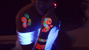 Once you the gold fish tattoo, you can have the eye touched using a clear uv ink to make it unique and attractive. Incredible Glow In The Dark Tattoos Youtube