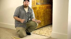 After using your carpet iron to bond together your pieces of carpet and heat up the adhesive on your seams, you will want the design of this tool works great for removing the tile. Carpet To Tile Doorway Transitions Youtube