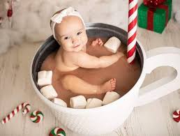 Keep a package of wipes that is at least half full in your suitcase. Hot Cocoa Christmas Session Baby Christmas Photos Christmas Baby Pictures Baby Milk Bath