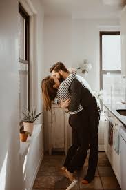 Nyc Engagement Session In Home Couple Kissing Lifestyle Photography Family Couple Photography Poses Couple Photography
