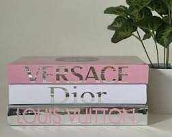 Jt/creative designed the concept and layout for this luxury coffee table book that reflects the clean, modern lines of the yacht. Set Of 4 Personalized Books Coffee Table Books Designer Etsy Book Decor Book Design Pink Wallpaper Iphone