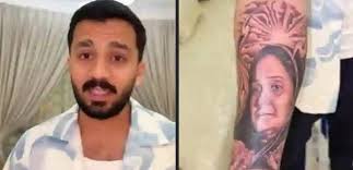 This guy seems to have lost it. He's been acting really strange lately. He  got a tattoo of his mom, but she doesn't even look like his mom. And the  theme of