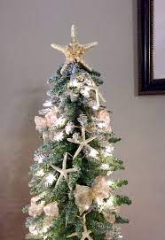 This is a quick and easy project with precut wooden items from the craft store. Starfish Garland Beach Decor Beach Garland Shell Garland Etsy Christmas Decorations Rustic Christmas Door Decorations Simple Halloween Decor