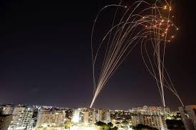 Israel's iron dome antimissile defense system fires at rockets launched from the gaza strip, as seen from ashkelon, in southern israel, on tuesday. 2bis2c E7hgkfm