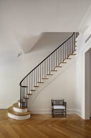 How difficult is trex signature® curved railing to install? A Brownstone For The 21st Century Remodelista Staircase Design Modern Staircase Townhouse Interior