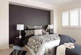 Some of the best accent wall color combinations are light and serene, like in this room that utilizes a grayscale gradient. Dark Deep Charcoal Grey Feature Wall Teamed With A Warm Off White Opposing Walls Feature Wall Bedroom Bedroom Wall Paint Colors Grey Wall Decor