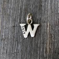 Might as well be a technology company, judging by its stock performance. Sterling Silver Baby Lowercase Letter W Initital Charm Luxe Design Jewellery