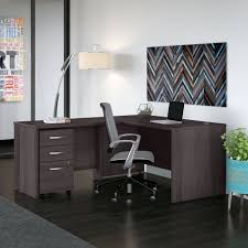 I am in the process of gathering all the parts to build desk, and was wondering how i can attach the two table surfaces together. Letourneaukeller Bush Business Furniture Studio C 60w X 30d L Shaped Desk With Mobile File Cabinet And 42w Return In Storm Gray