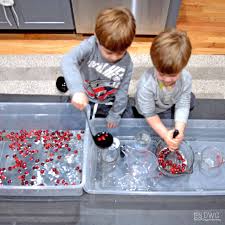 So the kids can use the rice to cook and create their own dishes, pretending and having a. Cranberry Scoop A Holiday Sensory Bin Days With Grey