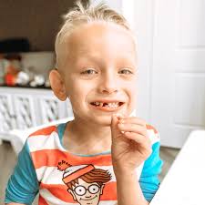 Your smile has a hole in it. Your silliness shows through, And more than  ever now I like exchanging grins with you. Someday, I know, you'll be a  man, At times impeccably