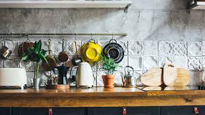 It's sophisticated, bright and still earthy because of the wood panels used as the backsplash. Stunning Kitchen Backsplash Ideas