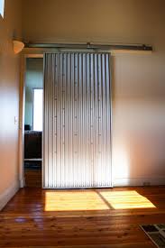 Check Out This Interior Sliding Door Made From Corrugated Metal In Galvalume Sliding Doors Interior Barn Doors Sliding Metal Building Homes