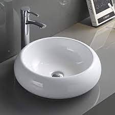 Now that the vanity has a facet installed and hole for the sink, you can install the sink for the last time. Ruvati 18 Inch Round Bathroom Vessel Sink White Above Vanity Counter Circular Porcelain Ceramic Rvb0318 Amazon Com