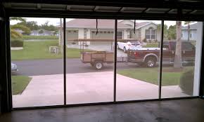 The Lifestyle Garage Door Screen Is A Fully Retractable Garage Screen Door That Works With Your Existing Garage Doo Garage Screen Door Screen Door Garage Doors