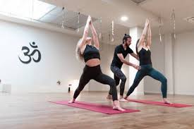 We specialize in women yoga and if you are looking for a reliable yoga classes for ladies near me, pradipika institute of yoga & therapy is the place for you. Calm Women And Man Concentrated On Stretching Doing High Lunge Pose On Yoga Class Stockphoto
