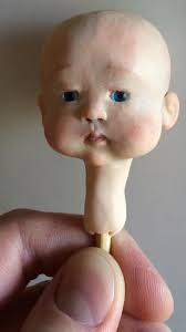 💞 The sculpting, painting, and varnishing of this baby's head are  complete. Made with flexible polymer clay and detailed with acrylics, now  it's time to give it a body. Fabric work is