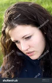 Teenage Looking Down Concentrating Expression On Stock Photo 3531725