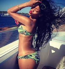 Rihanna has once said that music is in her d.n.a. See Rihanna S Entire Tattoo Collection Rihanna Bikini Rihanna Tattoo Celebrity Tattoos