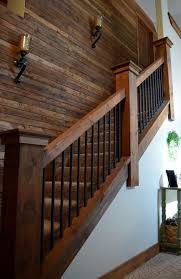The stairs are beautiful and welcoming when you first walk into the home. Rebar Staircase Unique Farmhouse Industrial Rustic Lighting Wood Plank Wall Rustic Stairs Rustic House Farmhouse Stairs