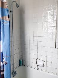 The Best Thing We Did To This Rental Bathroom Was Almost Free Cleaning Shower Tiles Shower Tile Cleaner Shower Tile