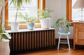 Shaker style heater covers these shake style model a custom radiator covers add simplicity and grace to any decor because they look like furniture. 10 Stylish Diy Radiator Covers