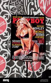 Ashley Massaro autographs the April Issue of 