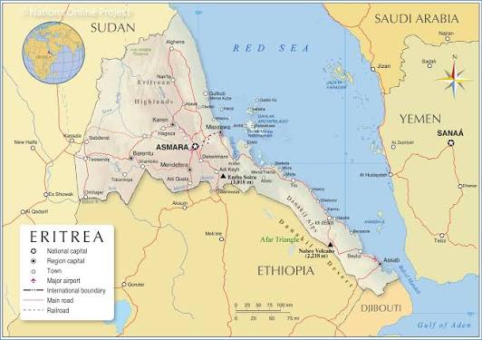 A view of the UK border sign and a map of Eritrea.