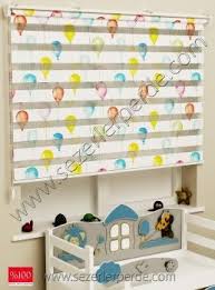 Ancak klasik zebra perdelerden farklı olarak, çocuk odası zebra perde modelleri üzerlerinde renkli, neşeli ve cıvıl cıvıl desenler taşır. Cocuk Odasi Zebra Perde Kategorisindeki Perde Modelleri Sezerler Perde