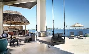 Hammocks are the ultimate lounge furniture to read in or take a nap on. Trendy Hanging Bed In The Transitional Porch Homesthetics Homesthetics Inspiring Ideas For Your Home