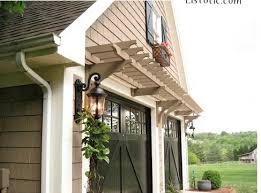 Love The Idea Of Lights Beside The Garage Door So You Can See The Sides When You Drive In House Exterior Garage Pergola Easy Curb Appeal Ideas