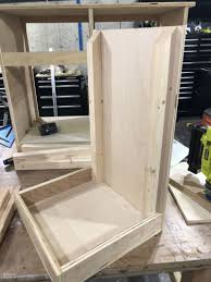 To make this one, you just attach a round laundry hamper or canvas bin to some diy casters to make it roll. Diy Tilt Out Laundry Hamper The Navage Patch