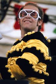 Elite elton is a professional elton john tribute act with an uncanny, authentic resemblance (as mentioned on the bbc) in looks and voice to sir elton john. Elton John S Crazy Outfits Throughout The Years Your Song Elton