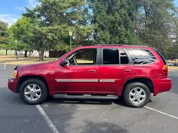 Image result for Red 2003 Envoy