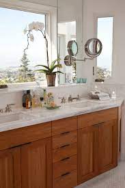 Perhaps the greatest challenge with the bathroom's redesign was the window over the vanity. A Window Above The Bathroom Sink Feature Or Flaw