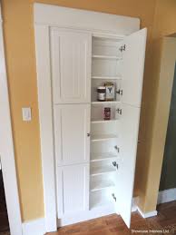 A Shallow Pantry Cabinet In Place Of The Pre Existing Doorway We Created Another Doorway Www Showcase Interiors Co Pantry Wall Shallow Pantry Corner Pantry