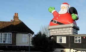 Maybe you would like to learn more about one of these? Huge Inflatable Santa Is Strapped To Pub Roof And High Winds Mean It S Ripping Out Tiles Daily Mail Online