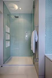 Go for mosaic glass tiles in a recurring border, or use a border of black tiles to divide a white and brown mosaic tile creation, breaking up the wall space. 44 Modern Shower Tile Ideas And Designs 2021 Edition