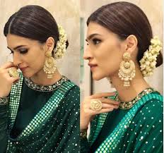 The hair is scissor cut nice and neat and will allow for growing the hair out even longer over. 10 Gajra Hairstyle Inspirations From Our Favorite Bollywood Celebs The Wedding Brigade Blog
