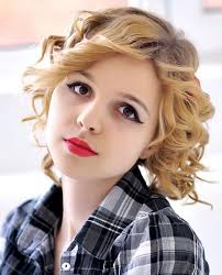 For starters, pixies and center parts are pretty darn flattering for these haircuts and hairstyles for round faces from celebrities can be inspiration for your next cut. Curly And Wavy Hairstyle With Golden Brown Hair Color On Stylevore