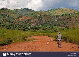 Iceland is typically divided into seven different geographical regions, including the reykjavík capital area. Ein Mann Mit Dem Fahrrad In Hugeliger Landschaft Burundi Bujumbura Mairie Bujumbura Stockfotografie Alamy