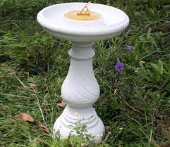 Windchimes and weathervanes speak for. Swirl White Sundial Gardensite Co Uk