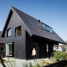 Chris Collaris Architects Builds Black Wooden Cottage With Exaggerated Roof Gable Roof Design Architecture House Gable Roof