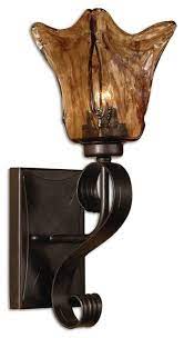 World market rewards members must log in to www.worldmarket.com to. Wrought Iron And Amber Art Glass Wall Sconce Old World Mediterranean Wall Sconces By My Swanky Home Houzz