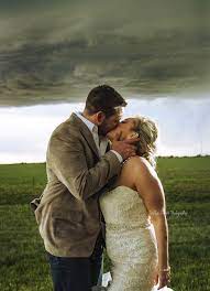 Mike olbinski is a phoenix and scottsdale, az wedding photographer offering family portraits in arizona. Newlyweds Take Epic Wedding Picture With A Photobomb Above Their Heads From Mother Nature Accuweather