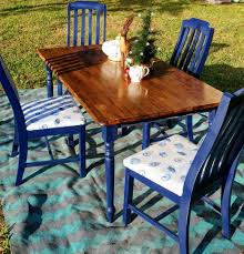 Wooden Table And Chairs Painted In Rustoleum Navy Blue Gloss Spray Paint The Top Of The Tabl Painted Kitchen Tables Painted Dining Table Diy Dining Room Table