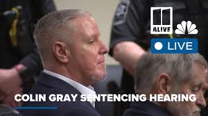 Father who gave his son the gun used in a Georgia high school shooting to be sentenced